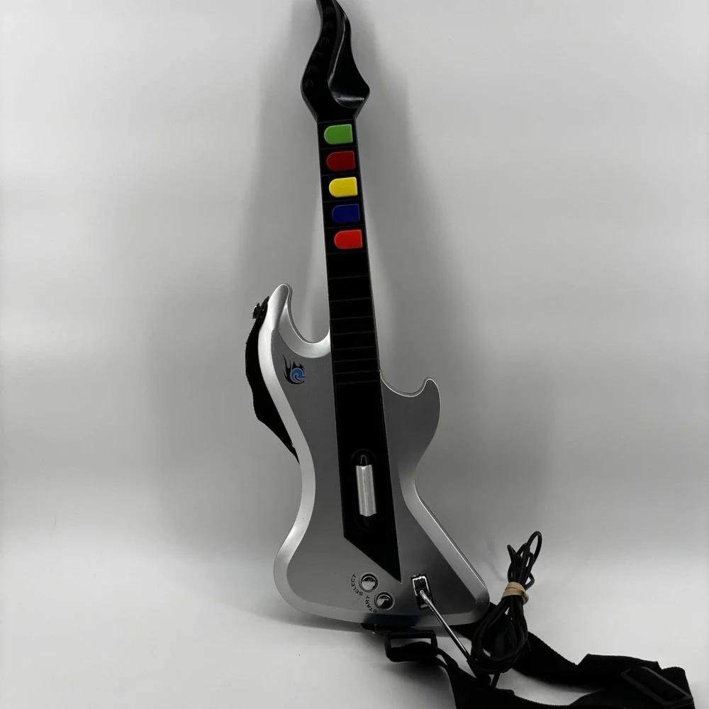 PS2 Guitar Hero React Rocker RTPS26 Silver Wired Guitar w/Strap. Untested